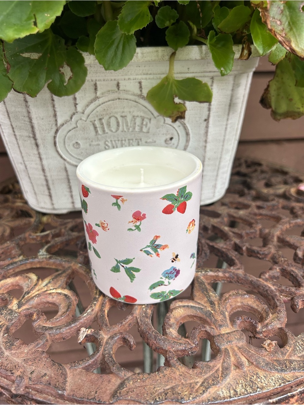 Strawberry and Blond WoodAnthropologie White Candle with Multicolor Floral Motif